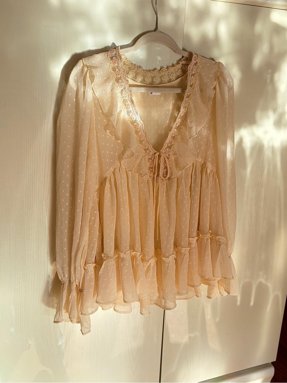 Kimchi Blue Sheer Ruffled Swiss Dot Blouse in Pale Peach